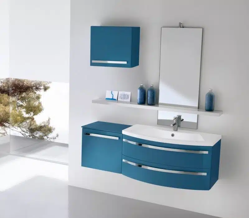 Mobile bagno curvo Compab CH 11 con base portalavabo a due cassetti e lavabo in Mineralmarmo.