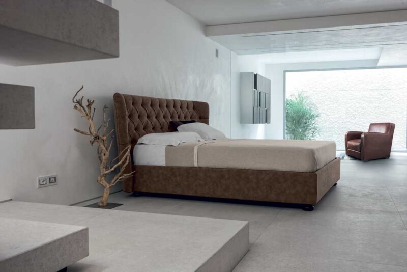 Hypnos - Letto matrimoniale elegante imbottito in tessuto o ecopelle