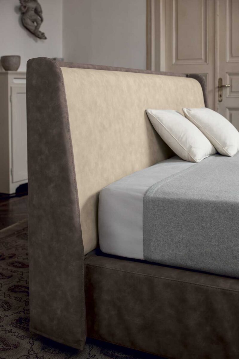 Marin - Letto matrimoniale design dalle linee sinuose imbottito in tessuto o ecopelle