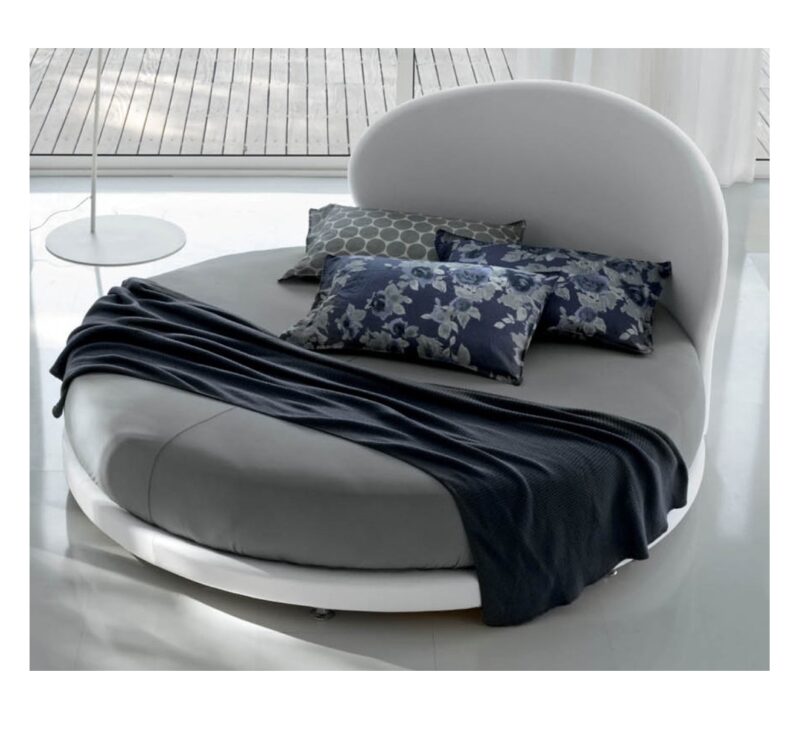 Letto rotondo design a conchiglia modello Kaleido con testiera curva.