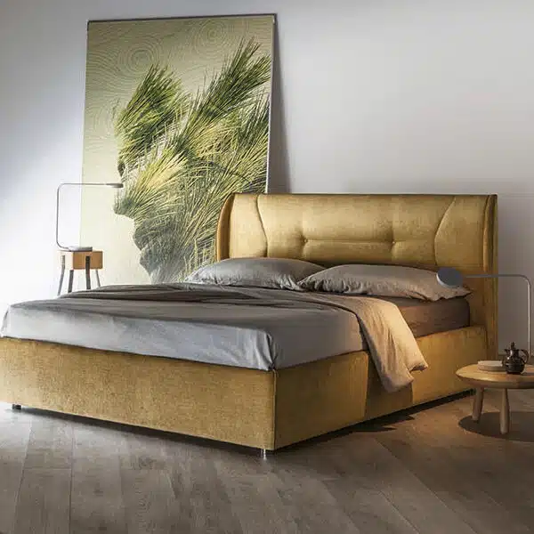 Letto Matrimoniale Demetra RigoSalotti: design moderno imbottito, vista frontale in camera da letto contemporanea.