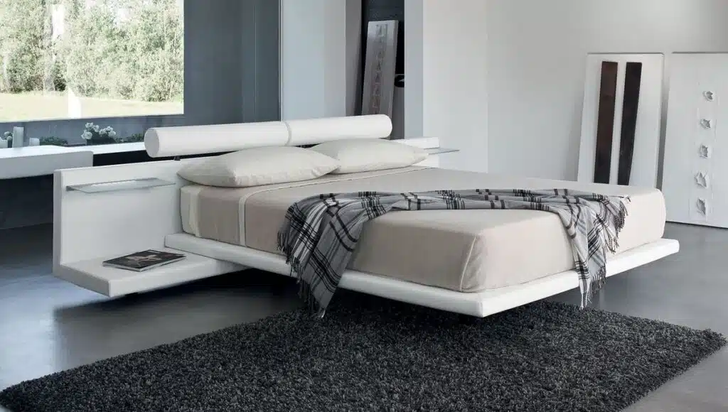 Letto Matrimoniale Design Jojoba con comodini integrati, vista frontale, arredamento camera da letto moderna.