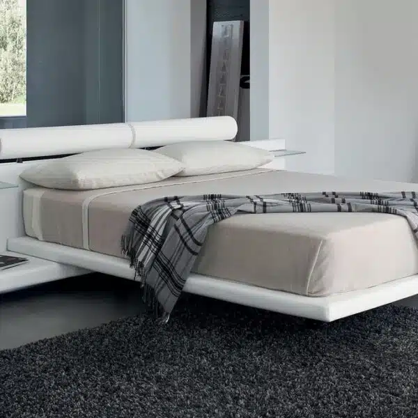 Letto Matrimoniale Design Jojoba con comodini integrati, vista frontale, arredamento camera da letto moderna.