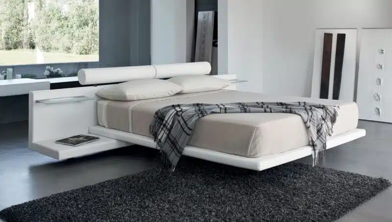 Letto Matrimoniale Design Jojoba con comodini integrati, vista frontale, arredamento camera da letto moderna.
