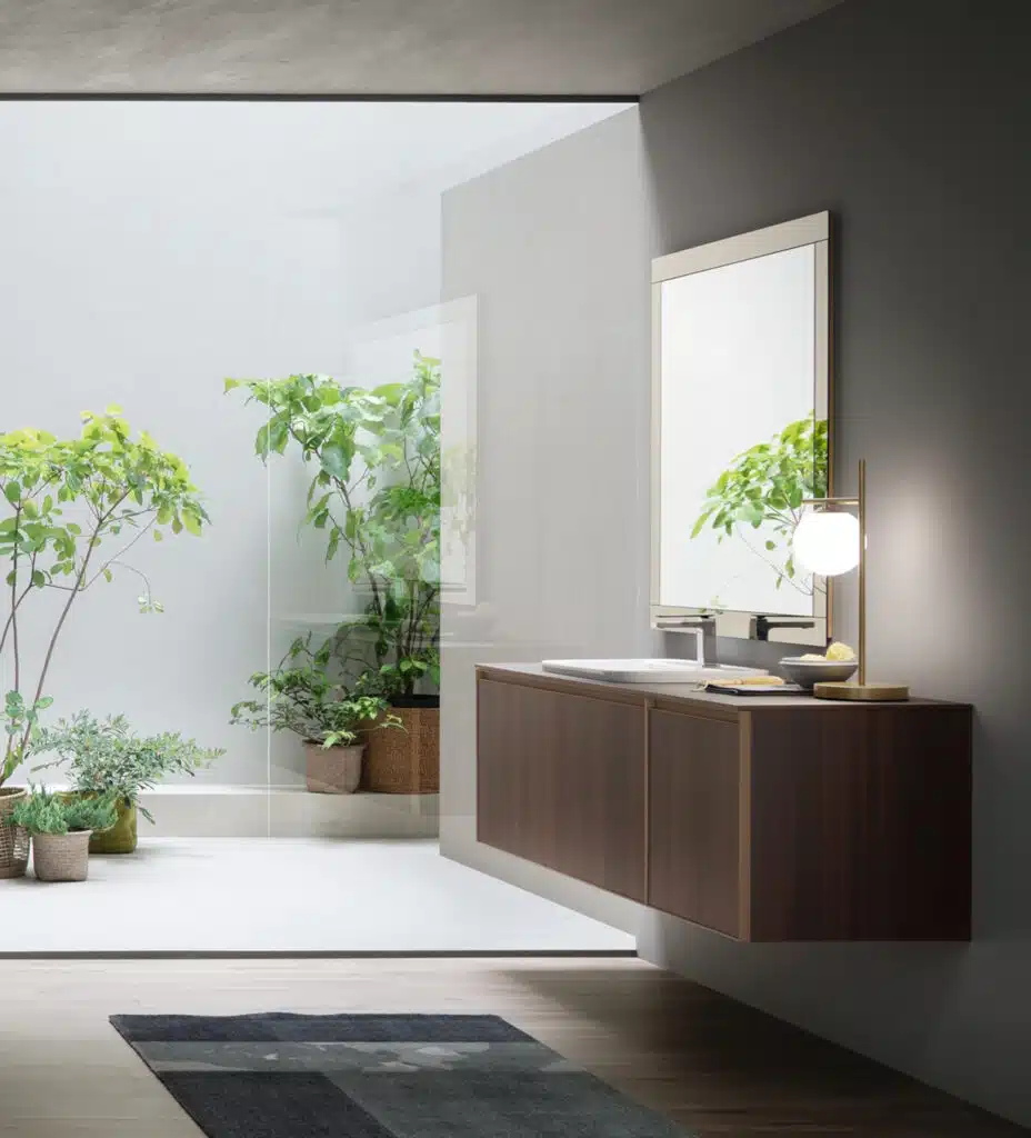 Arcom Shape 01: dettaglio materiale eucalipto e maniglia bronzo, finiture di pregio per bagno.