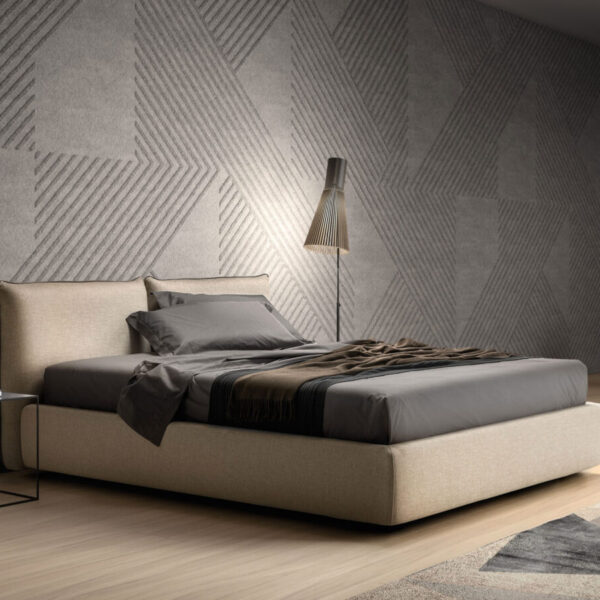 Letto Matrimoniale modello MODERN Samoa in tessuto, visto di tre quarti in una camera da letto moderna.