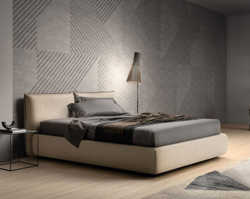 Letto Matrimoniale modello MODERN Samoa in tessuto, visto di tre quarti in una camera da letto moderna.