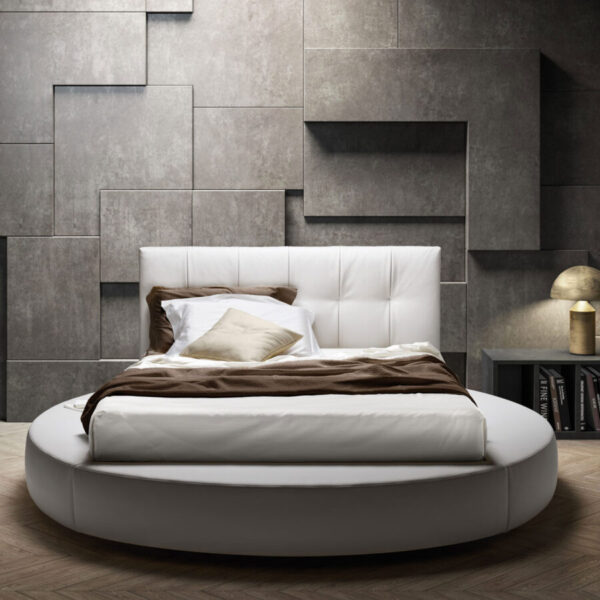 Letto Matrimoniale rotondo modello SPECIAL Samoa in tessuto, visto dall'alto in una camera da letto di design.