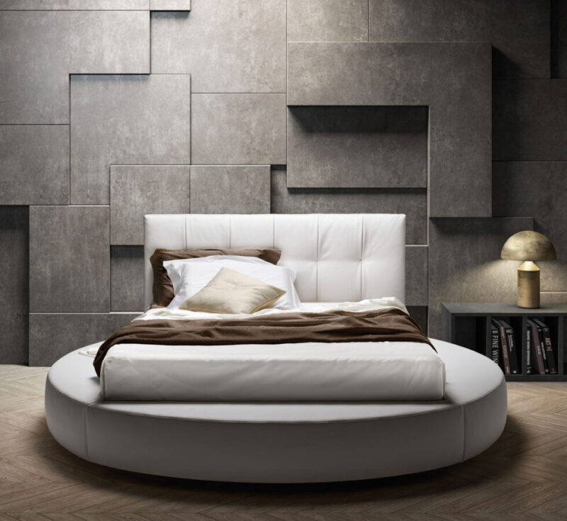 Letto Matrimoniale rotondo modello SPECIAL Samoa in tessuto, visto dall'alto in una camera da letto di design.